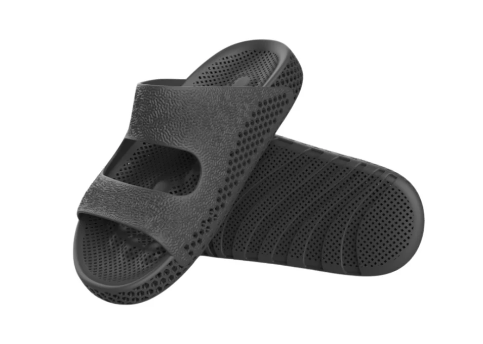 Wov3 WV-3 recovery shoe — black 3D-printed lattice slip-on with integrated massage footbed